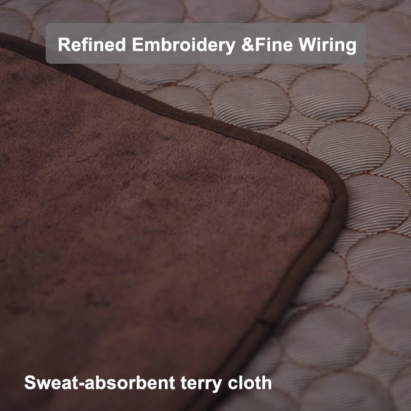A close-up of a brown sweat-absorbent terry cloth pet mat with refined embroidery and fine wiring.