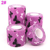 Rolls of purple printed self-adhesive elastic bandage tape with a butterfly pattern