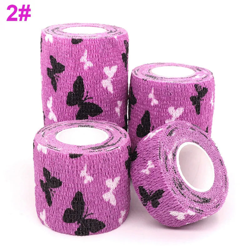 Rolls of purple printed self-adhesive elastic bandage tape with a butterfly pattern