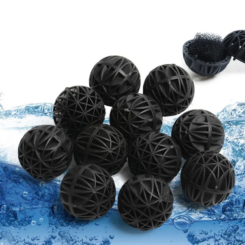 Black bio balls used for water filtration floating on blue water
