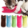 A collection of colorful catnip chew toys shaped like paws and teeth for cats.