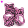 Rolls of pink and black leopard print self-adhesive elastic bandage tape.