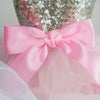 Pink sequined dog dress for puppies with a pink satin bow