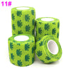 Roll of bright lime green printed self-adhesive elastic bandage tape with a pattern of dark green leaves