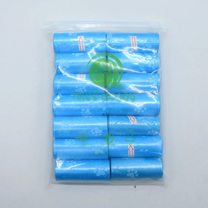 A pack of 14 blue paw print dog waste bags with dispensers in a clear plastic bag.