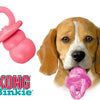 A pink KONG Binkie teething chew toy for puppies, shown with its silicone ring and chewable body.