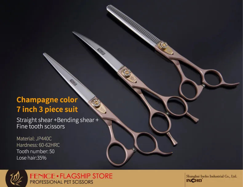 A set of champagne color straight and bending shear scissors for professional pet grooming.