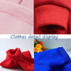 Display of premium fleece dog coat and hoodie in pink, red, and blue colors