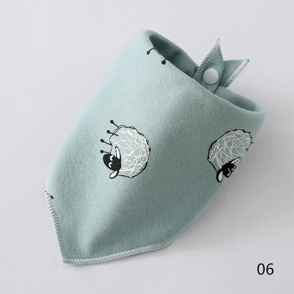 A light blue cotton pet bandana with a white embroidered design of a sleeping animal.