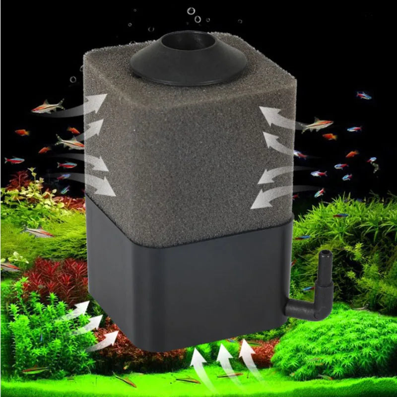 A black bio sponge filter is shown in an outdoor garden setting with fish swimming around it.
