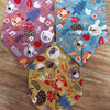 Three colorful cotton pet bandanas featuring woodland animal patterns for dogs and cats
