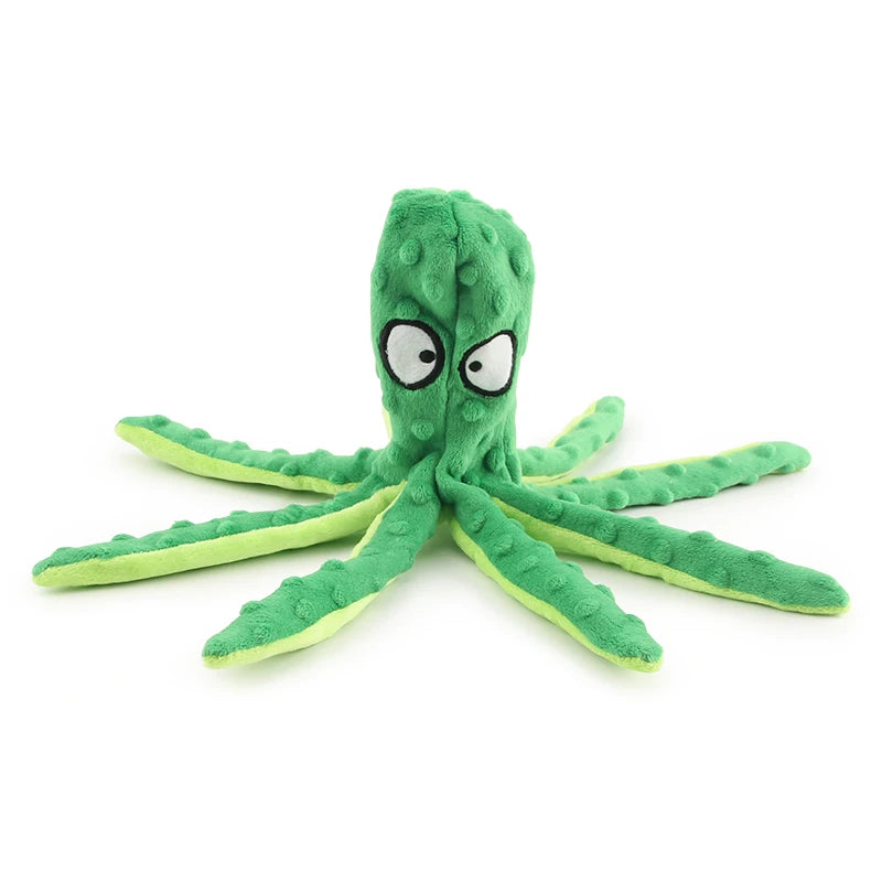 A bright green interactive sea turtle plush toy with large white eyes, lying flat.
