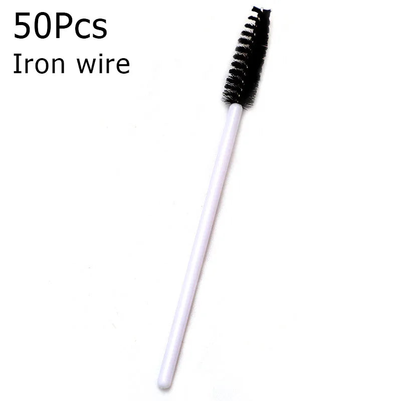 A single black iron wire eyelash brush with a white handle.