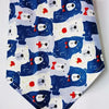 A fabric featuring cute blue and white bear faces in a repeating pattern for pet bandanas.