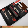 A black case containing a professional pet grooming scissors set with various combs and brushes.