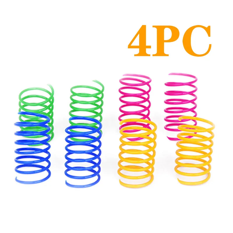 Four colorful spiral spring cat toys in green, blue, pink, and yellow.