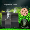 A black aquarium filter unit showing water flow and filter media balls with fine bubbles.