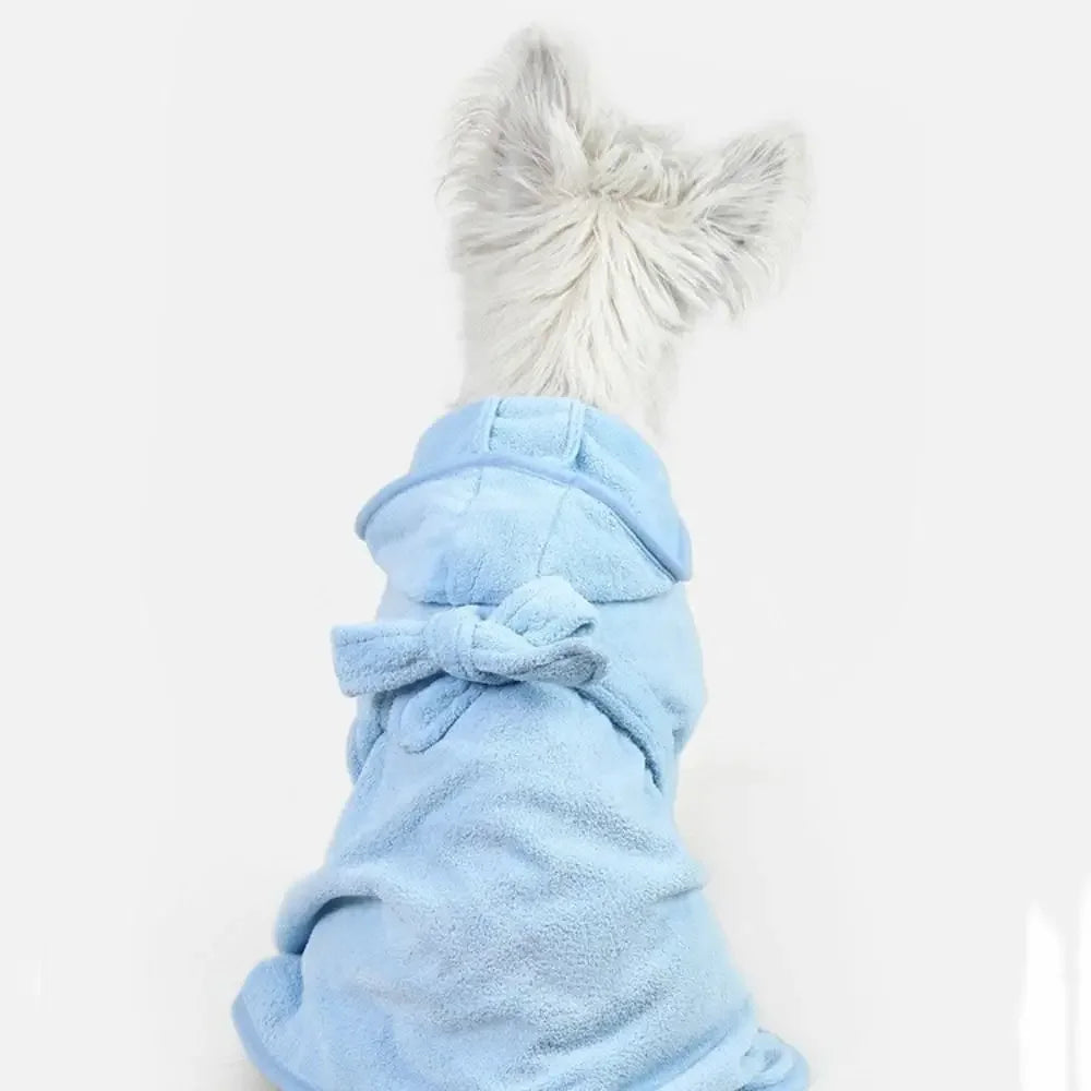 A fluffy white pet bath robe with a matching light blue hood and tie-back detail.