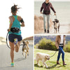 A woman is jogging while wearing a hands-free dog walking belt and leash, with a dog running beside her.