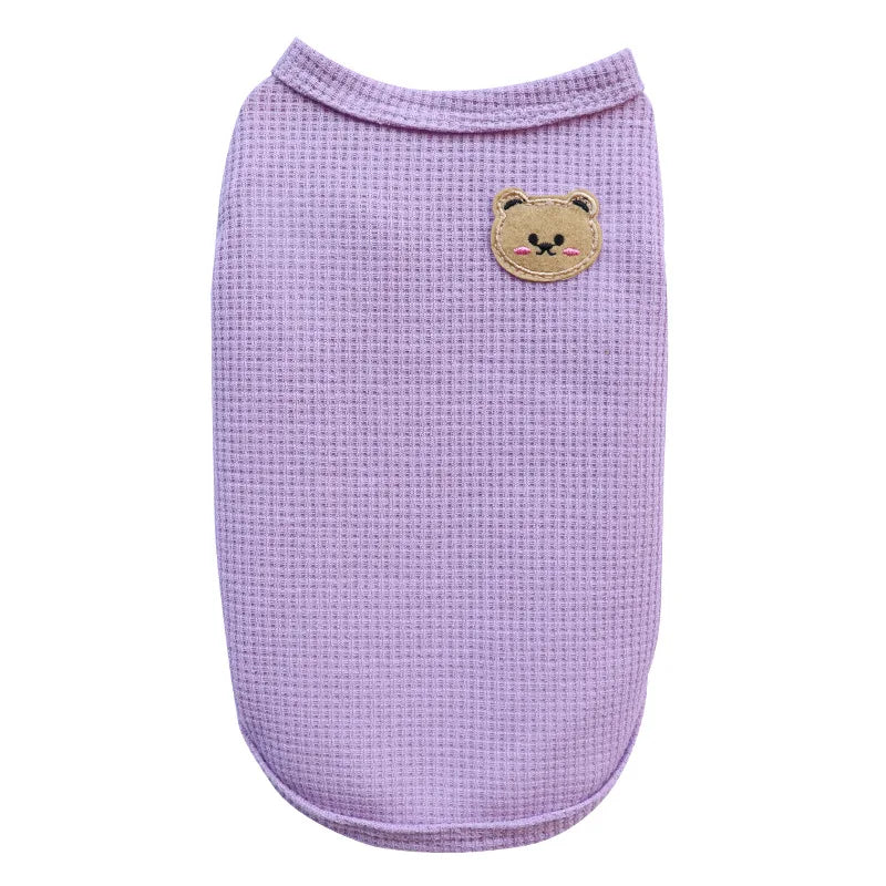 A lavender knitted pet shirt for small dogs or cats featuring a cute bear patch