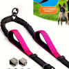 Black and pink dual dog leash coupler with soft padded handles and bungee shock absorber