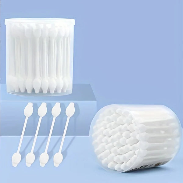 A collection of white gentle pet ear cleaning cotton swabs is shown in various arrangements.