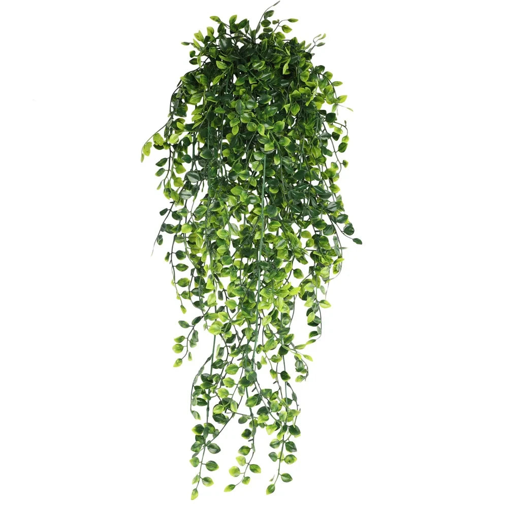 Kaskadierendes Arrangement aus künstlichen Farnblättern zur Home-Dekoration.