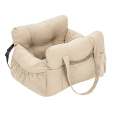 A beige durable pet car seat with safety straps shown from the side.