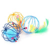 Colorful interactive cat toy featuring a rolling mouse and sand chamber in various bright colors.
