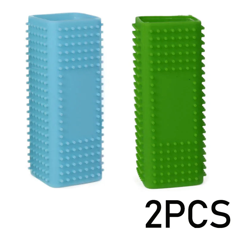 Two silicone pet hair removal brushes, one light blue and one green, with hollow rubber bristles.