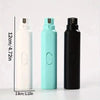 Three bottles of electric pet nail grinders for dogs and cats in white, teal, and black.
