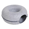 A round, gray felt cat bed with a tunnel hideaway entrance for two cats.