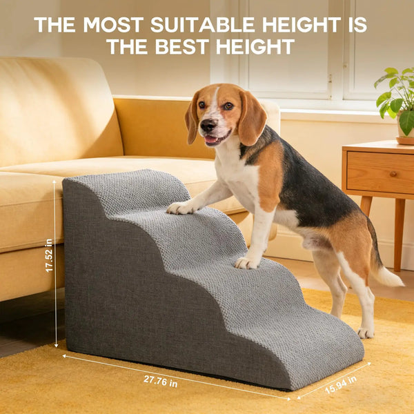 A dog is using a gray multi-tiered pet stairs and ramp set on a yellow rug indoors.