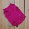 A bright pink short-sleeved t-shirt for a child featuring a charming crown pattern.