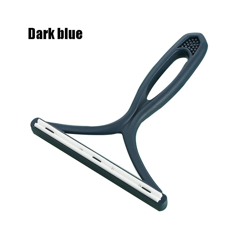 A dark blue silicone pet hair and lint remover tool with a handle and cleaning plate.