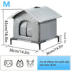 A gray heated outdoor cat shelter with a slanted roof and a metal frame, designed for kittens and adult cats less than 16 lbs