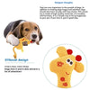 A yellow plush bone dog squeaky chew toy is shown next to a dog.