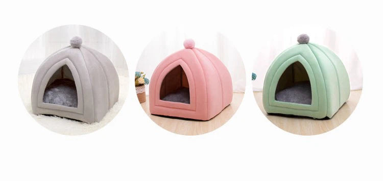 A cozy cat bed cave in light gray, pink, and green colors with a washable cushion.