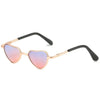 Gold-toned heart-shaped sunglasses with tinted lenses for pets