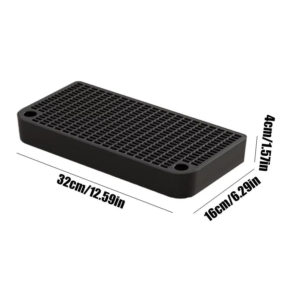 Black cat litter box ramp step with a filter tray, measuring 32cm long and 16cm wide.