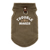A brown, fuzzy pet jacket for dogs with the text Trouble Maker embroidered on the chest.