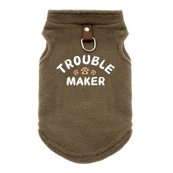 A brown, fuzzy pet jacket for dogs with the text Trouble Maker embroidered on the chest.