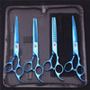 A set of professional stainless steel pet grooming scissors in blue housed in a dark protective case.
