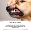 A dog's mouth is shown with a hand holding dental powder near the teeth and gums.