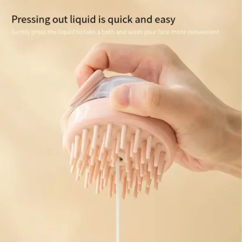 A hand is pressing liquid out of a soft silicone pet bath brush with a dispenser.