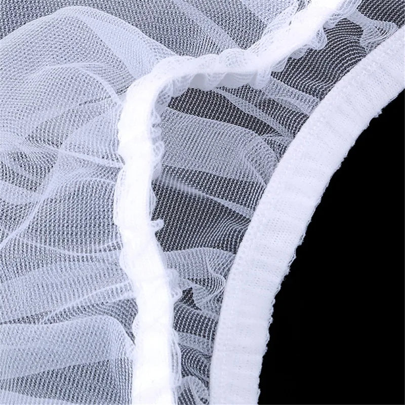 White nylon mesh skirt with a gathered edge, used as a debris guard.