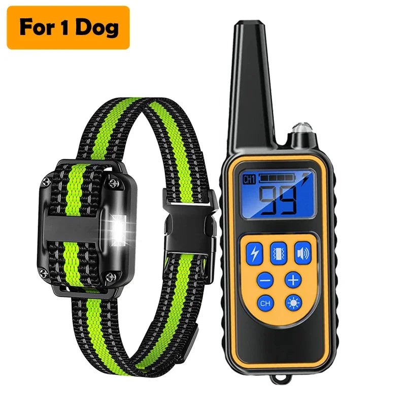 A black remote dog training collar with a yellow LCD display and a green strap is shown.
