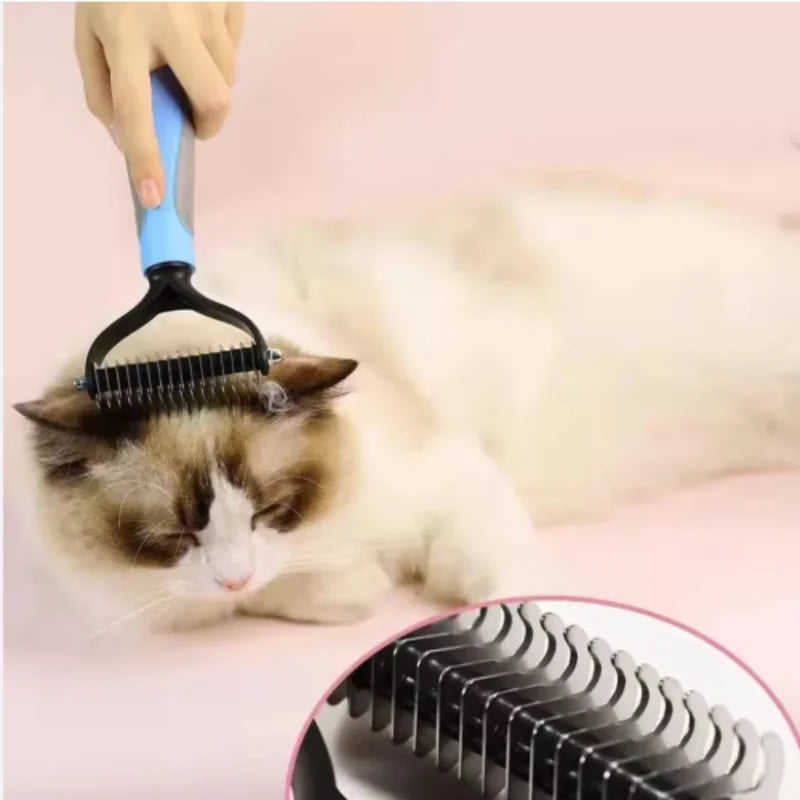 A hand is using a blue and black stainless steel pet deshedding comb on a cat.