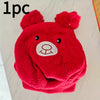 A bright red knitted hat and scarf set featuring bear ears.