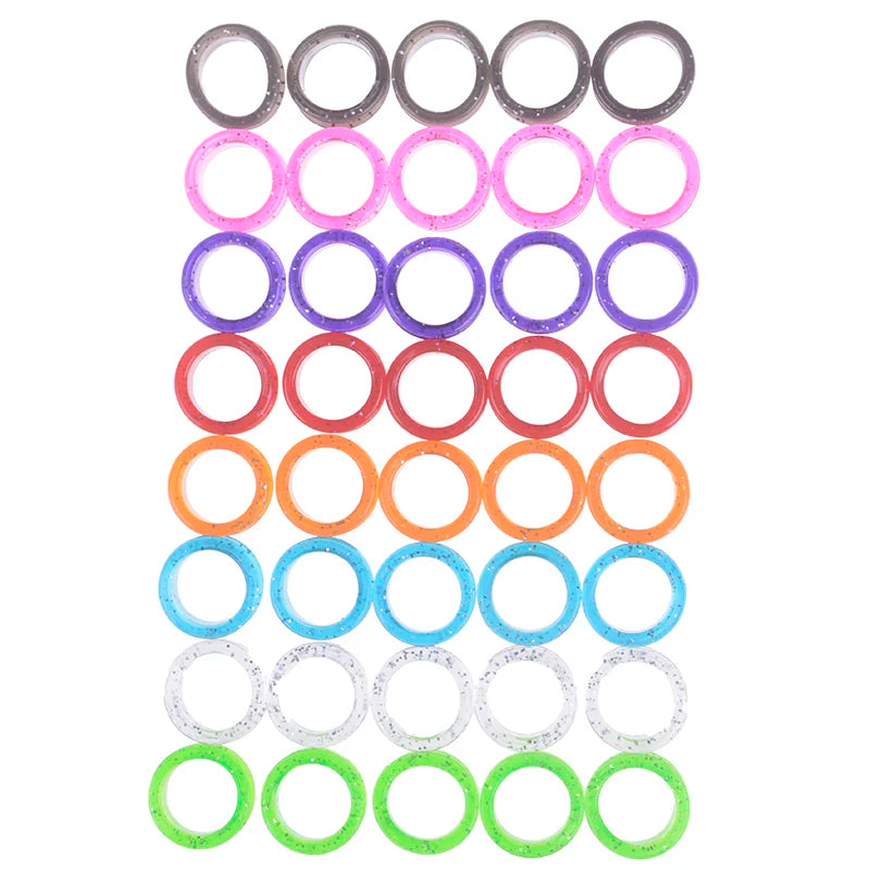 A set of colored silica gel hair scissors, arranged in rows of various colors.
